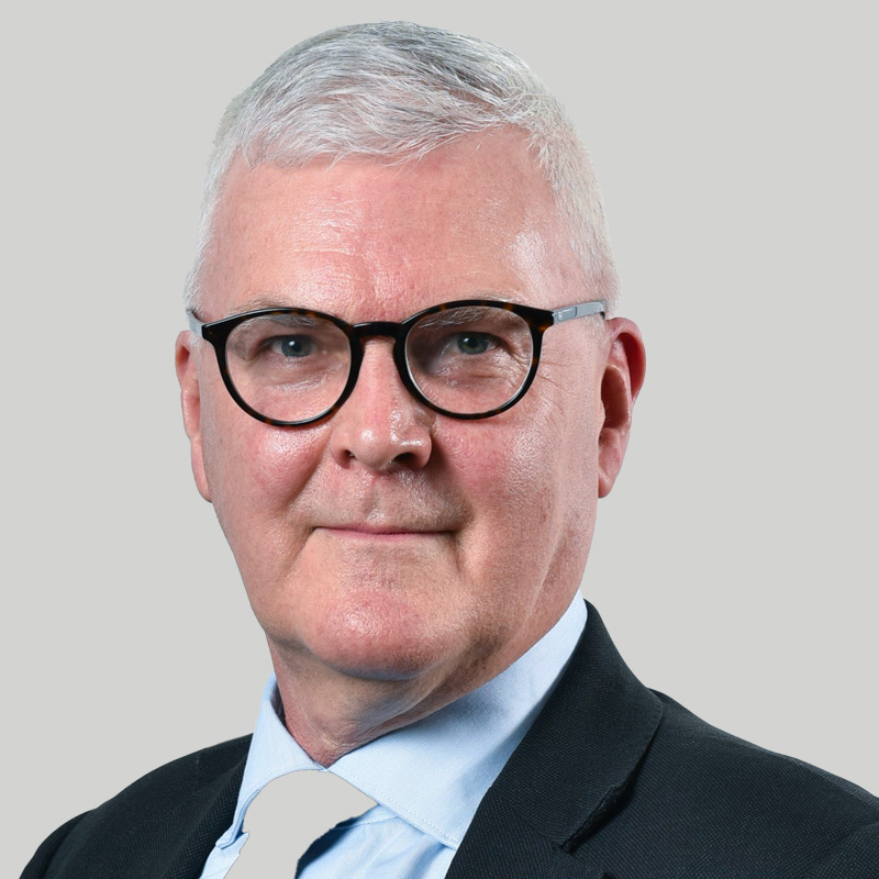 A professional headshot of David Young