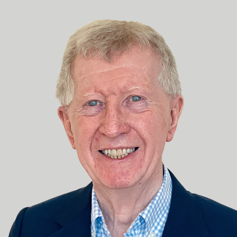 A professional headshot of Lawrence Churchill