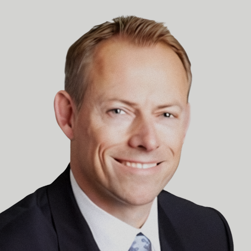 A professional headshot of Paul Dixon